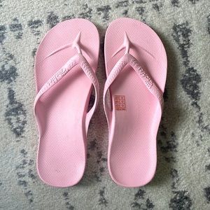 Archie’s flip flops